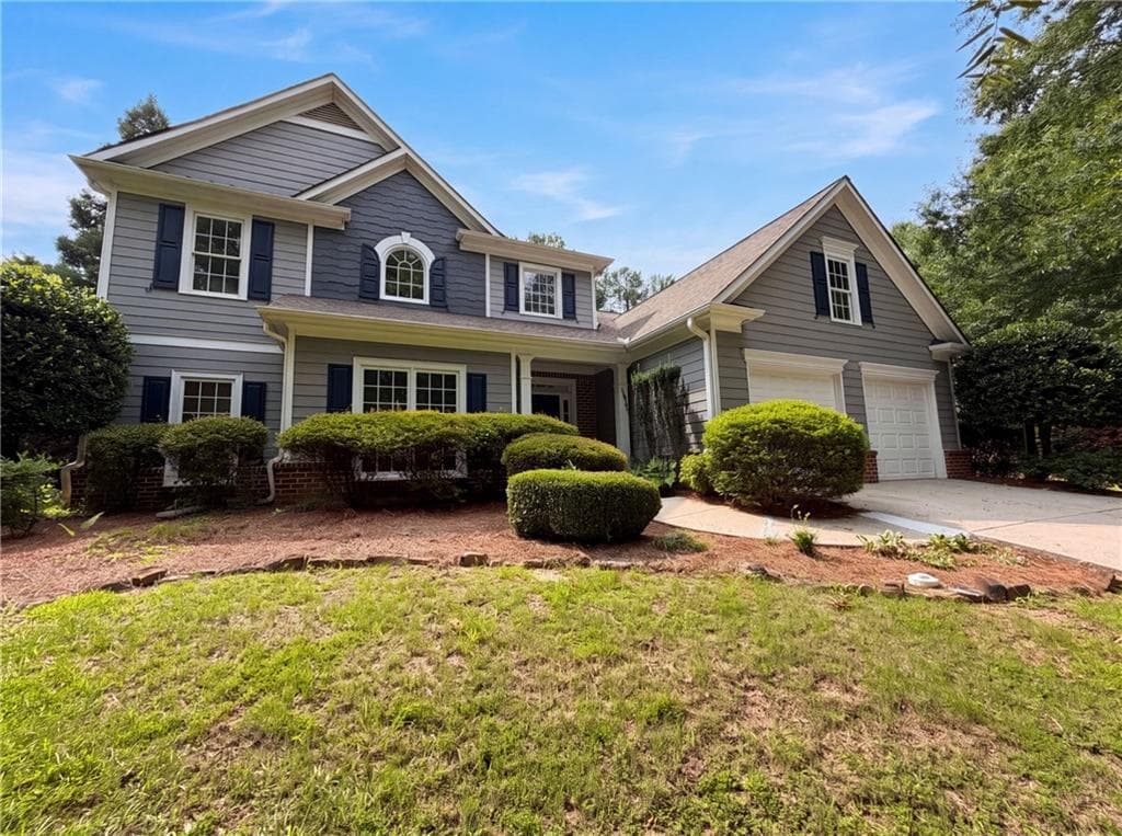 4 bedroom, 2 bathroom, 2,764 sq ft single family residence for sale at 8635 Amsbury Way, Cumming, GA 30041 — photo 1 of 47