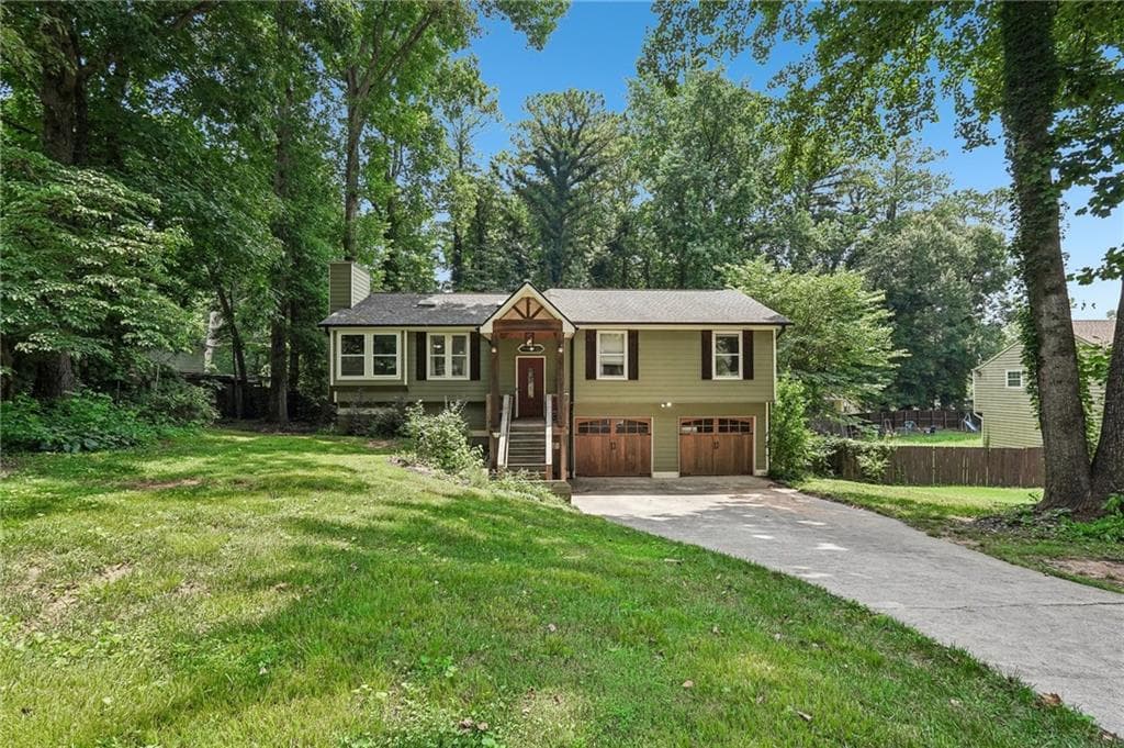 4 bedroom, 3 bathroom, 2,171 sq ft single family residence for sale at 3400 Chastain Crossing, Marietta, GA 30066 — photo 2