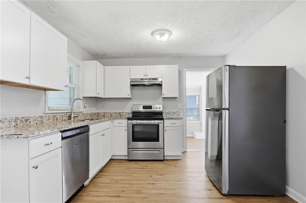 3 bedroom, 2 bathroom, 1,418 sq ft single family residence for sale at 1764 Atherton Drive, Decatur, GA 30035 — photo 4