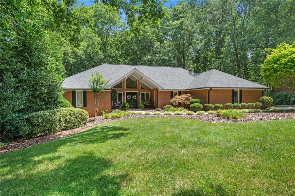 5 bedroom, 5 bathroom, 4,138 sq ft single family residence under contract at 11740 Mountain Laurel Drive, Roswell, GA 30075