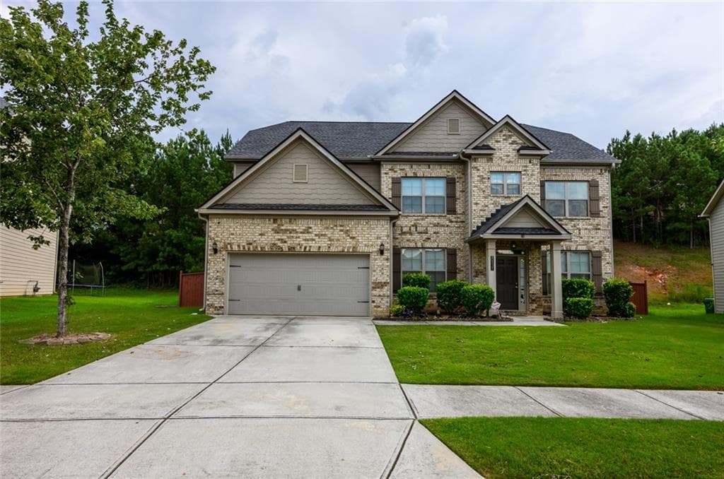 5 bedroom, 4 bathroom, 3,576 sq ft single family residence for sale at 8137 Nolan Trail, Snellville, GA 30039