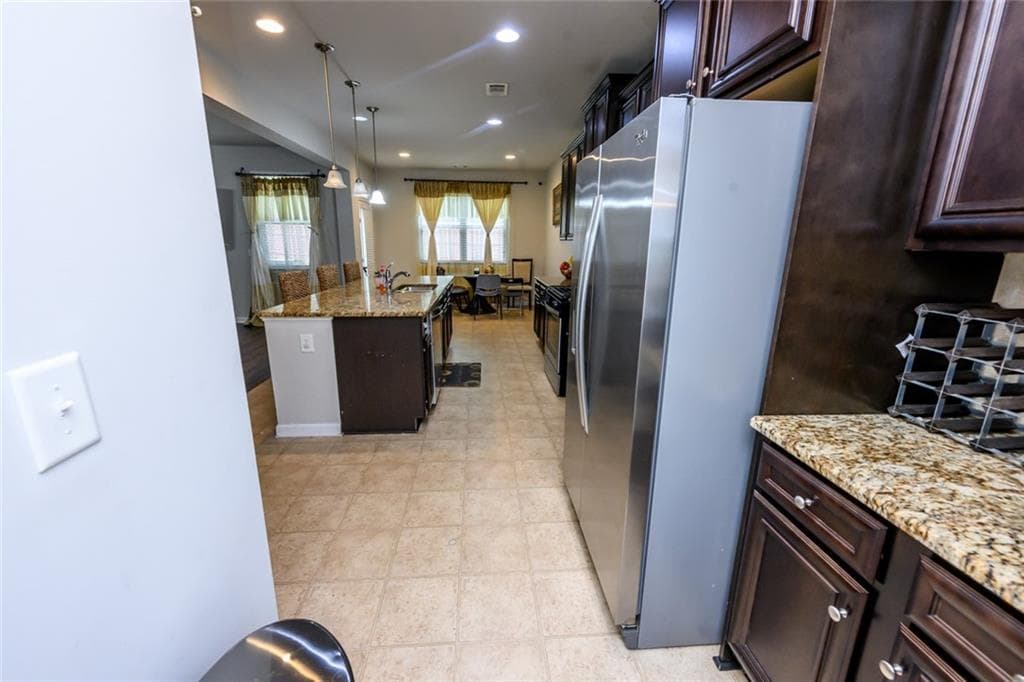 5 bedroom, 4 bathroom, 3,576 sq ft single family residence for sale at 8137 Nolan Trail, Snellville, GA 30039 — photo 9