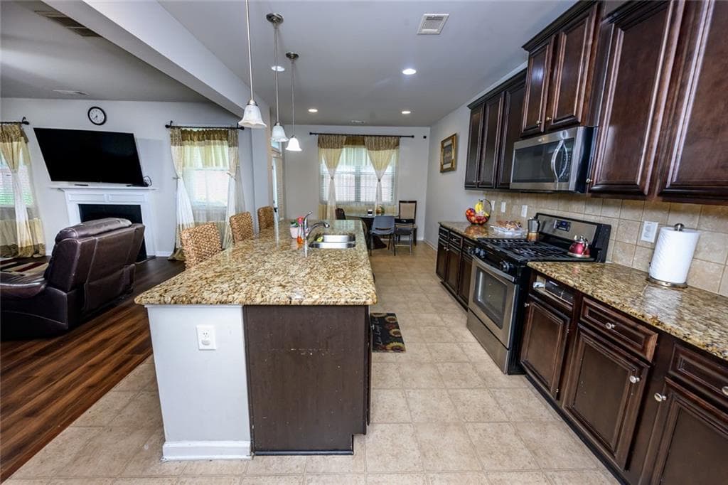 5 bedroom, 4 bathroom, 3,576 sq ft single family residence for sale at 8137 Nolan Trail, Snellville, GA 30039 — photo 10