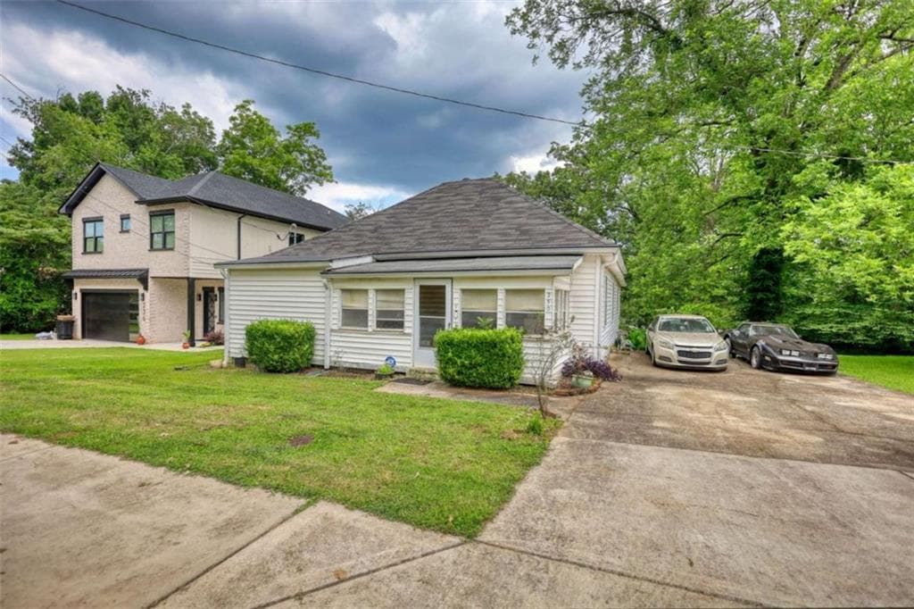 3 bedroom, 1 bathroom, 1,128 sq ft single family residence for sale at 250 Bona Rd, Buford, GA 30518 — photo 2