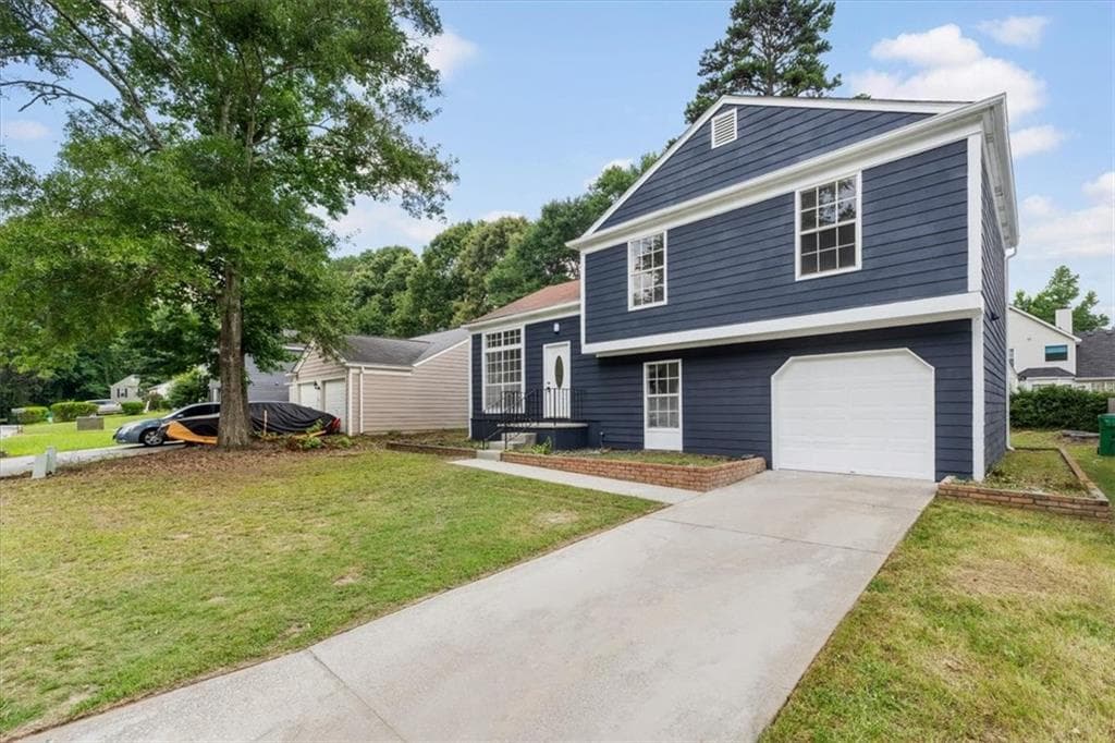 4 bedroom, 3 bathroom, 1,750 sq ft single family residence for sale at 6653 Eastbriar Drive, Lithonia, GA 30058 — photo 2