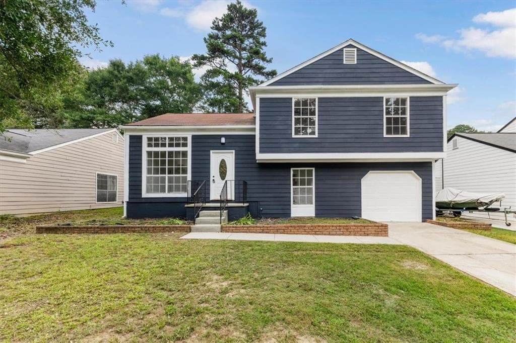 4 bedroom, 3 bathroom, 1,750 sq ft single family residence for sale at 6653 Eastbriar Drive, Lithonia, GA 30058 — photo 3