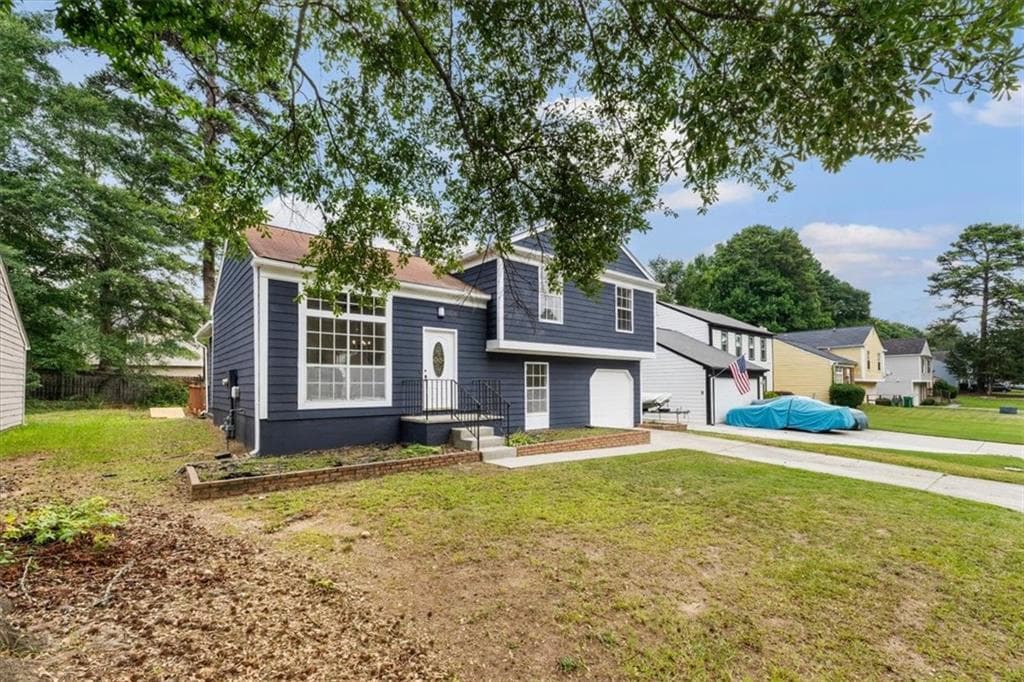 4 bedroom, 3 bathroom, 1,750 sq ft single family residence for sale at 6653 Eastbriar Drive, Lithonia, GA 30058 — photo 4