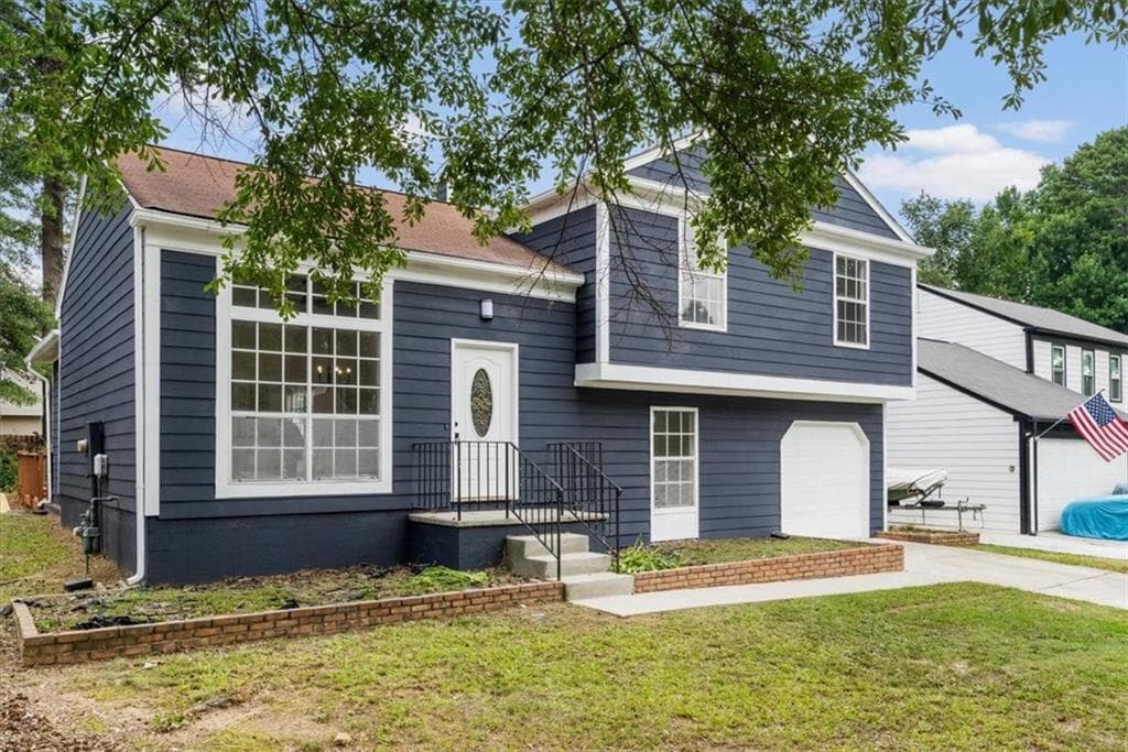 4 bedroom, 3 bathroom, 1,750 sq ft single family residence for sale at 6653 Eastbriar Drive, Lithonia, GA 30058 — photo 5