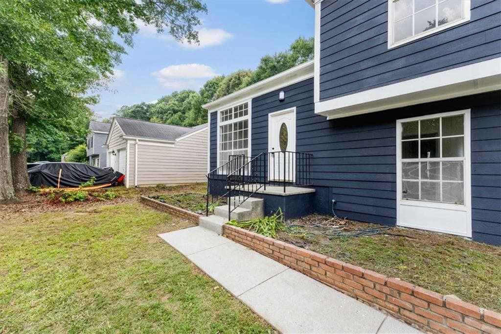 4 bedroom, 3 bathroom, 1,750 sq ft single family residence for sale at 6653 Eastbriar Drive, Lithonia, GA 30058 — photo 6