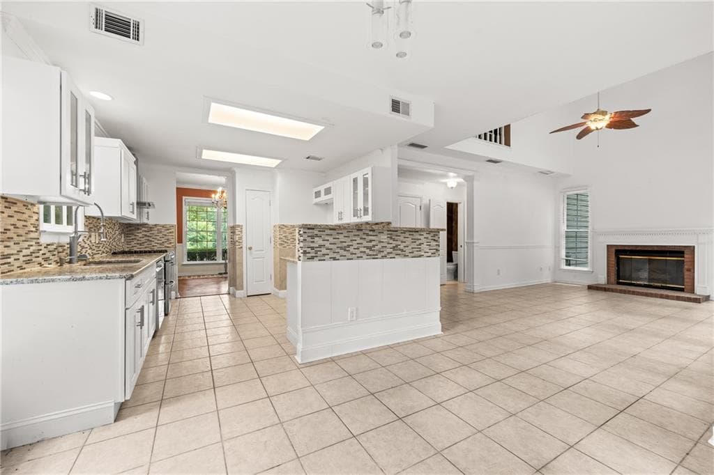 4 bedroom, 3 bathroom, 2,310 sq ft single family residence for sale at 4056 Watkins Glen Drive, Woodstock, GA 30189 — photo 3