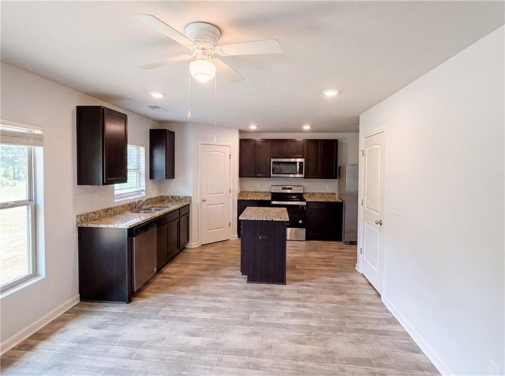 4 bedroom, 4 bathroom, 2,520 sq ft single family residence for sale at 1300 Mills Cove Drive, Covington, GA 30016 — photo 2