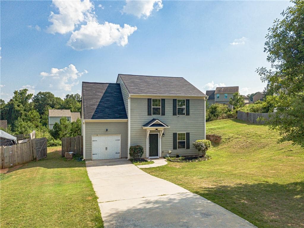 4 bedroom, 3 bathroom, 1,596 sq ft single family residence for sale at 707 Nonsuch Court, Winder, GA 30680 — photo 2