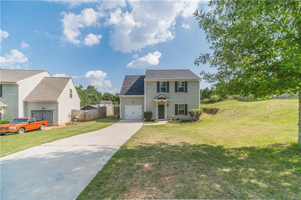 4 bedroom, 3 bathroom, 1,596 sq ft single family residence for sale at 707 Nonsuch Court, Winder, GA 30680 — photo 4