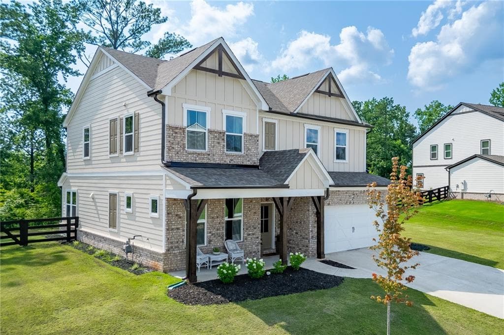 4 bedroom, 3 bathroom, 2,637 sq ft single family residence for sale at 7670 Homer Drive, Cumming, GA 30028 — photo 2