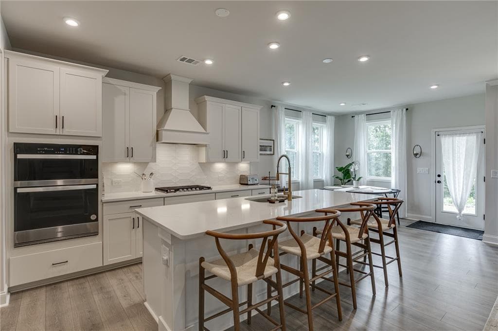 4 bedroom, 3 bathroom, 2,637 sq ft single family residence for sale at 7670 Homer Drive, Cumming, GA 30028 — photo 8