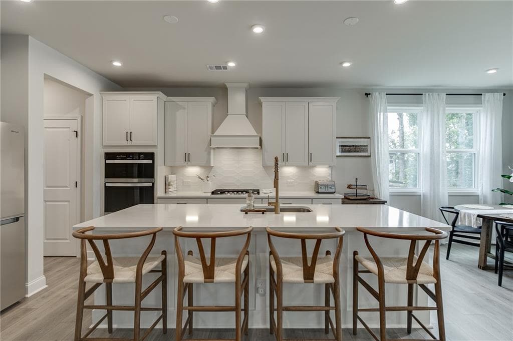 4 bedroom, 3 bathroom, 2,637 sq ft single family residence for sale at 7670 Homer Drive, Cumming, GA 30028 — photo 9