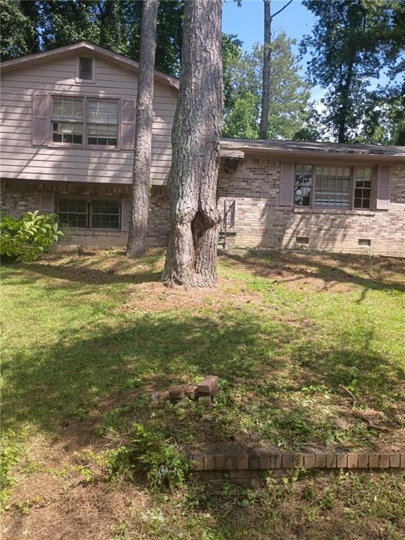 4 bedroom, 2 bathroom, 1,576 sq ft single family residence for sale at 2930 Carriage Lane, South Fulton, GA 30349 — photo 2