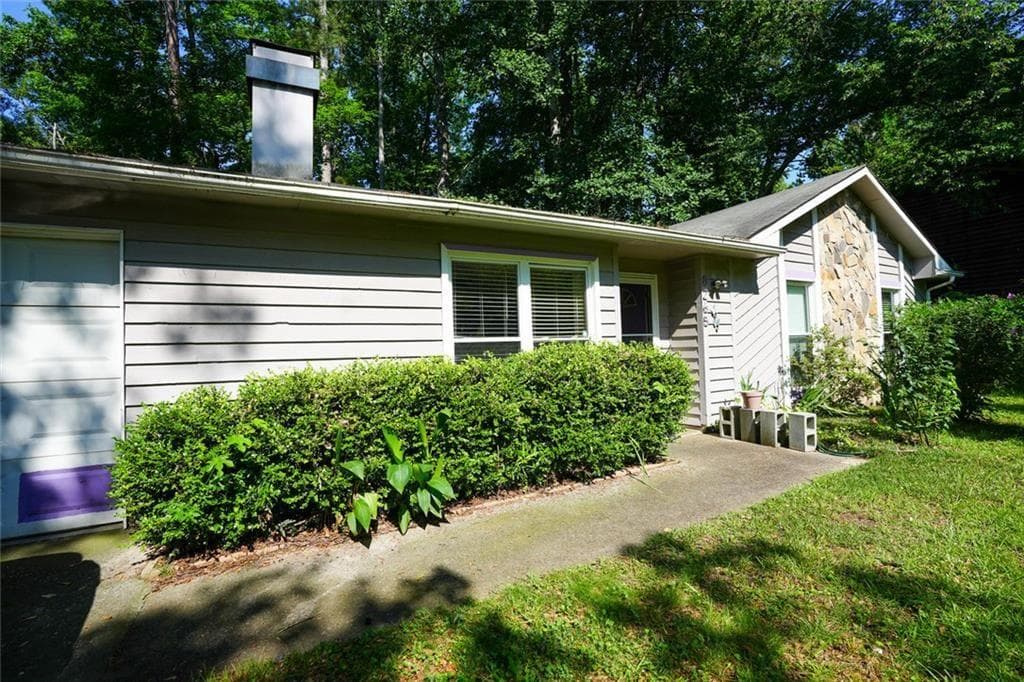 3 bedroom, 2 bathroom, 1,280 sq ft single family residence for sale at 8265 Park Ridge Drive, Riverdale, GA 30274 — photo 2
