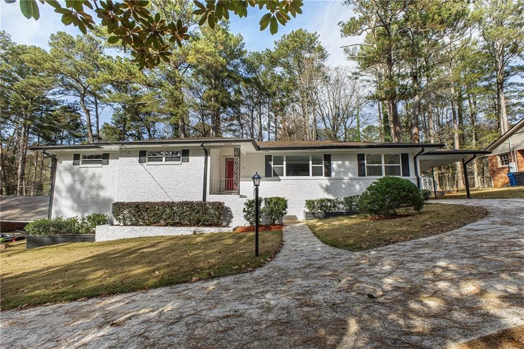 5 bedroom, 3 bathroom, 3,400 sq ft single family residence for sale at 2939 Arrowood Drive, Atlanta, GA 30344 — photo 1 of 30