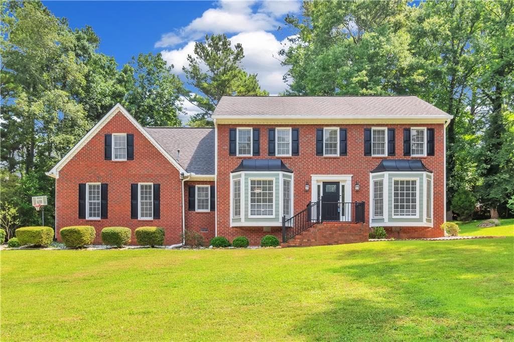 4 bedroom, 3 bathroom, 2,761 sq ft single family residence for sale at 1448 Red Fox Run, Lilburn, GA 30047 — photo 1 of 34