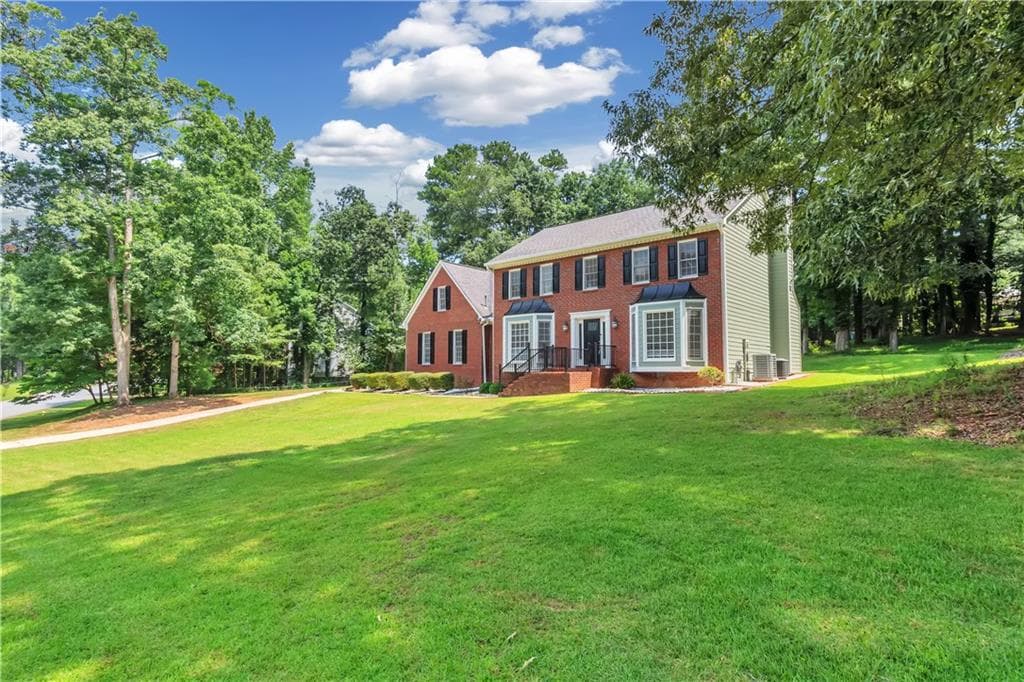 4 bedroom, 3 bathroom, 2,761 sq ft single family residence for sale at 1448 Red Fox Run, Lilburn, GA 30047 — photo 3