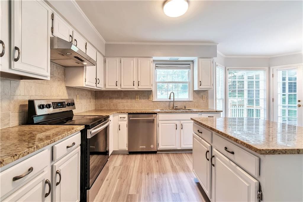 4 bedroom, 3 bathroom, 2,761 sq ft single family residence for sale at 1448 Red Fox Run, Lilburn, GA 30047 — photo 8