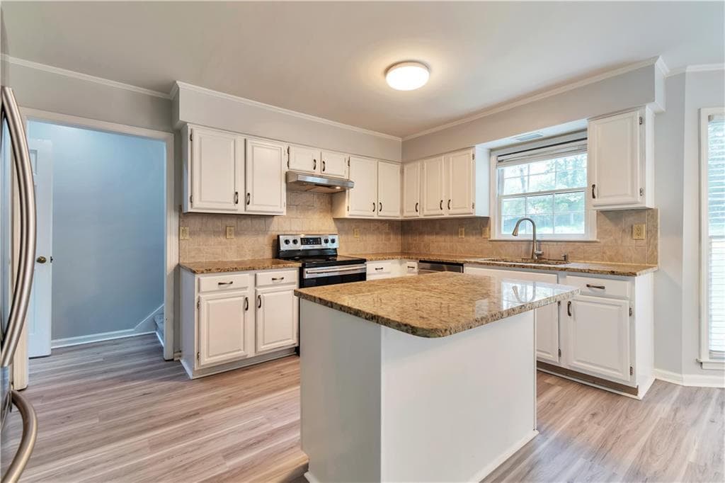 4 bedroom, 3 bathroom, 2,761 sq ft single family residence for sale at 1448 Red Fox Run, Lilburn, GA 30047 — photo 9