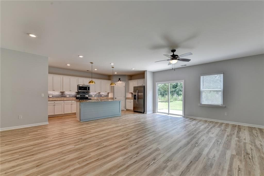 5 bedroom, 3 bathroom, 2,239 sq ft single family residence for sale at 404 Golden Eagle Parkway, Braselton, GA 30517 — photo 7