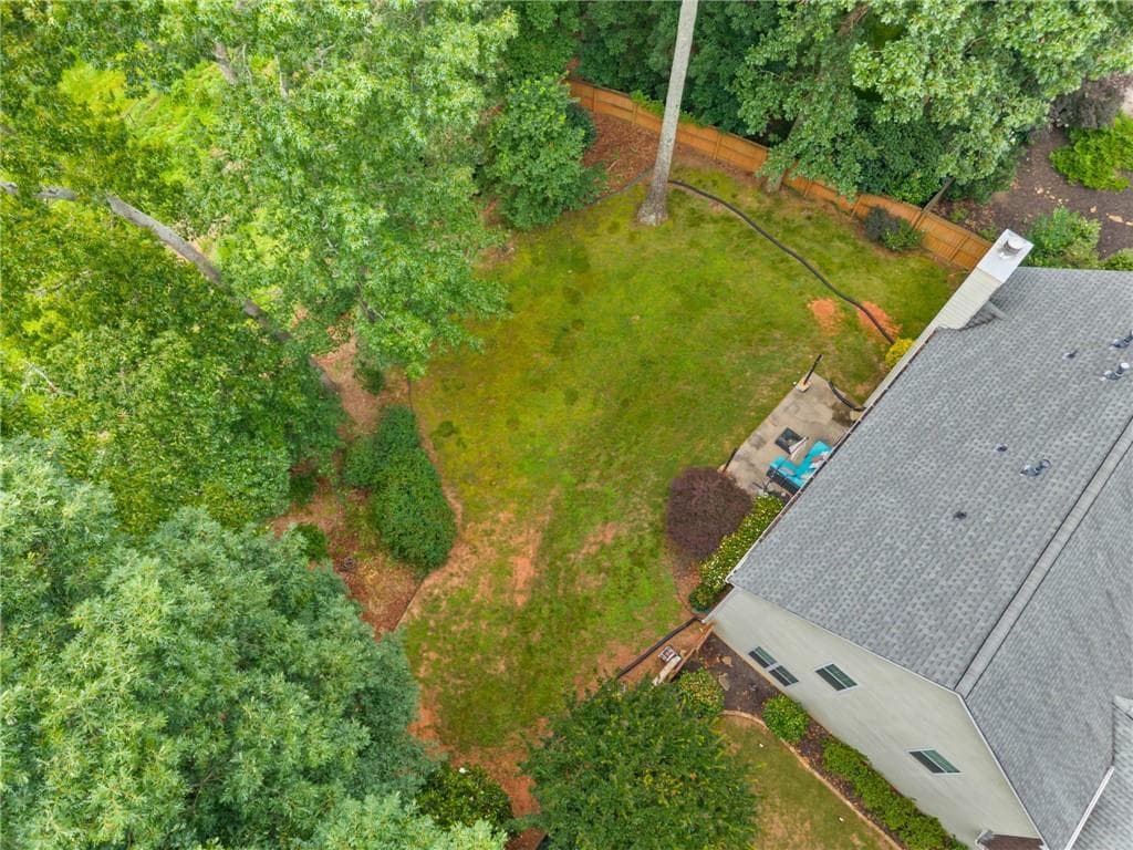 4 bedroom, 3 bathroom, 2,576 sq ft single family residence for sale at 6459 Millstone Cove Drive, Flowery Branch, GA 30542 — photo 4