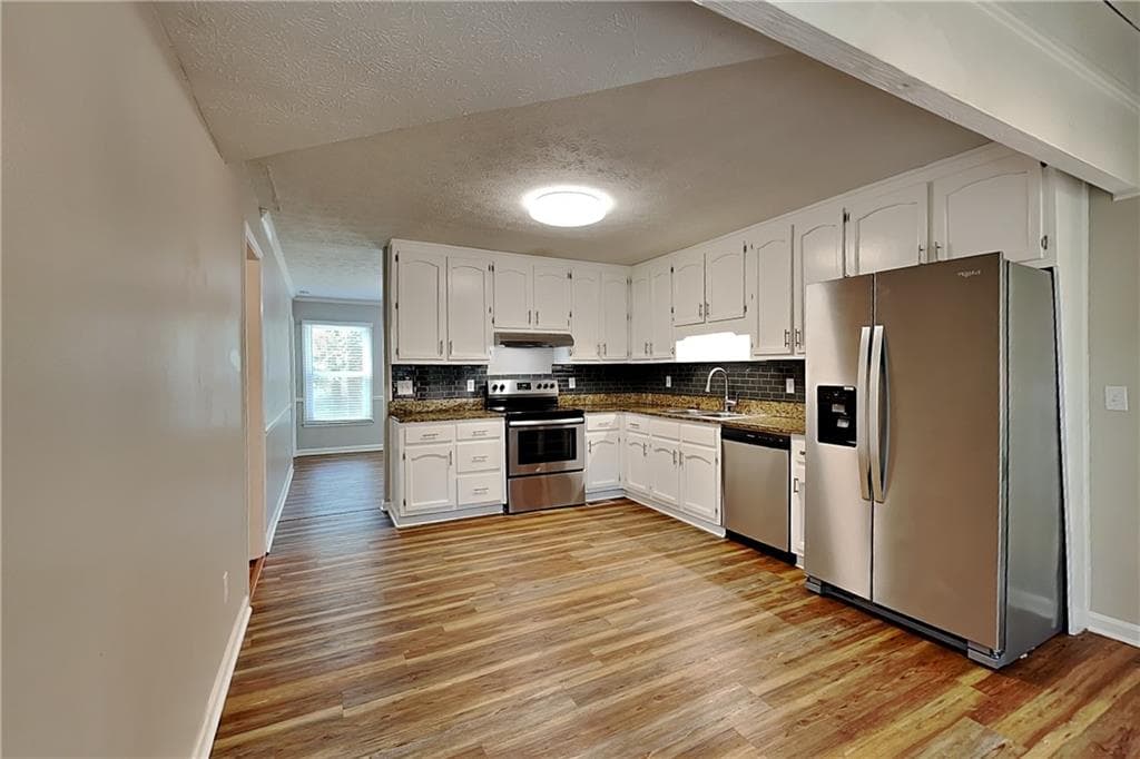 4 bedroom, 3 bathroom single family residence for rent at 6839 Woodcreek Lane, Douglasville, GA 30135 for $2,145 a month — photo 6