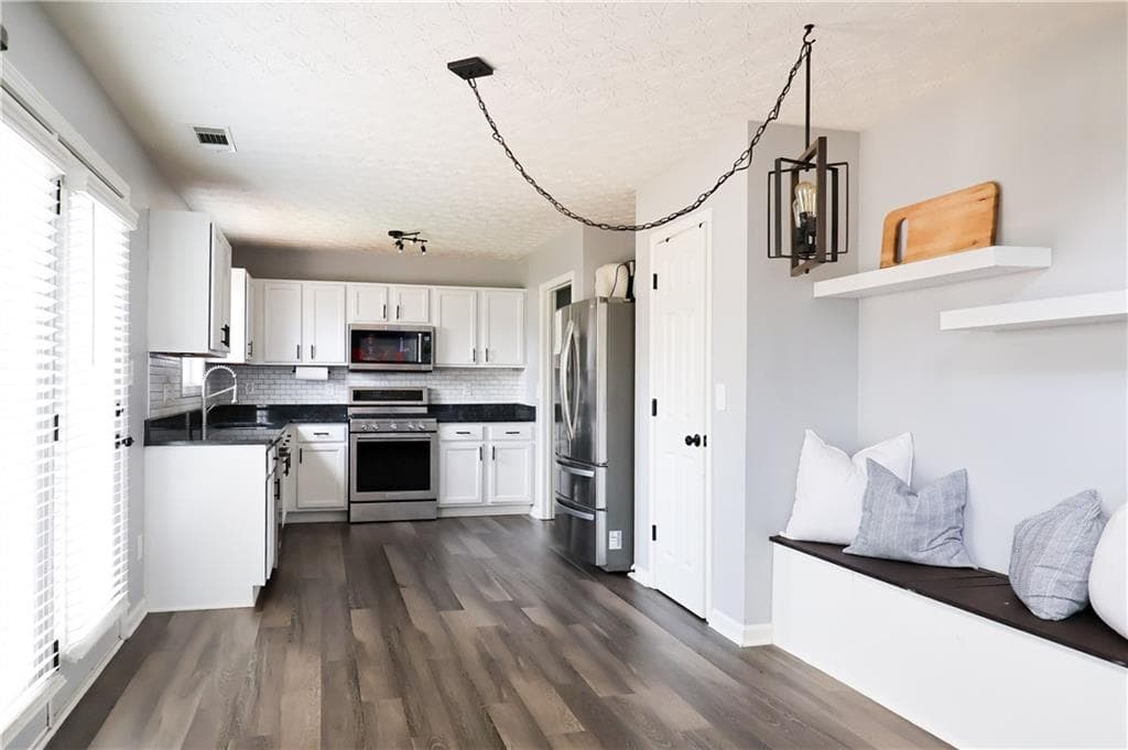3 bedroom, 3 bathroom, 1,874 sq ft single family residence for sale at 1228 Pine Acre Drive, Sugar Hill, GA 30518 — photo 5