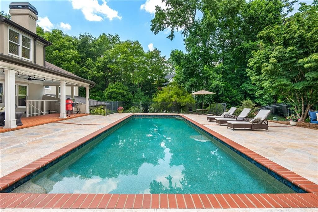 6 bedroom, 7 bathroom, 7,043 sq ft single family residence for sale at 1025 Stonegate Court, Roswell, GA 30075 — photo 3