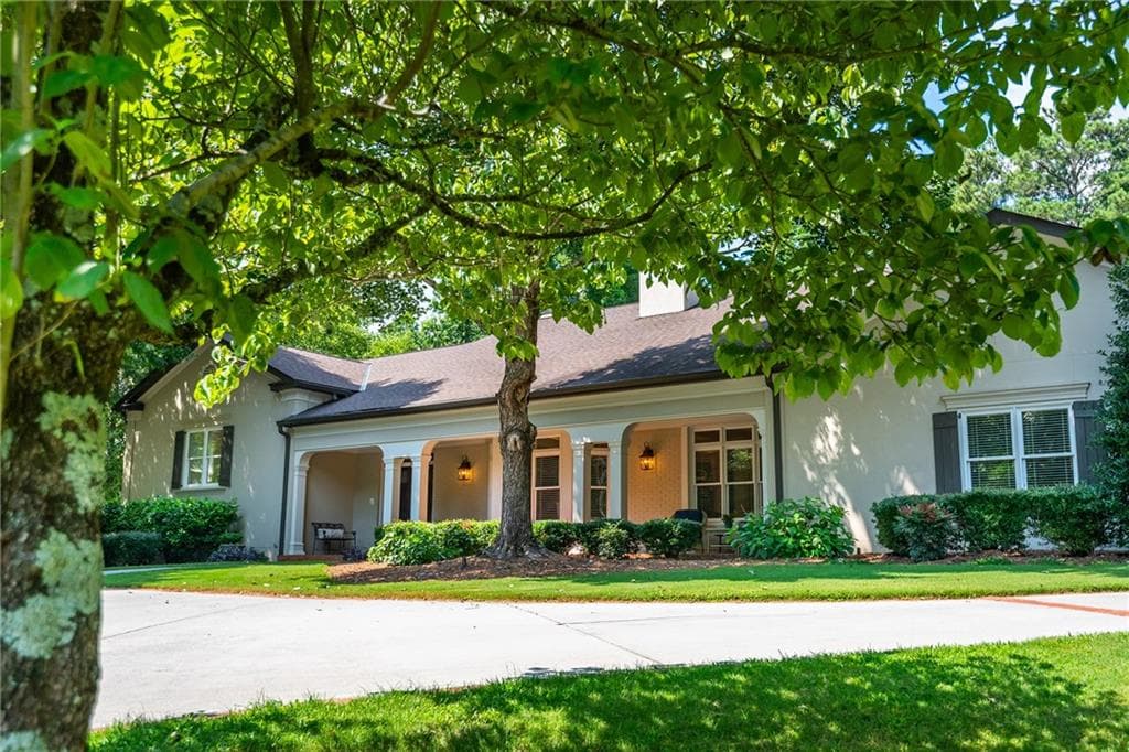 6 bedroom, 7 bathroom, 7,043 sq ft single family residence for sale at 1025 Stonegate Court, Roswell, GA 30075