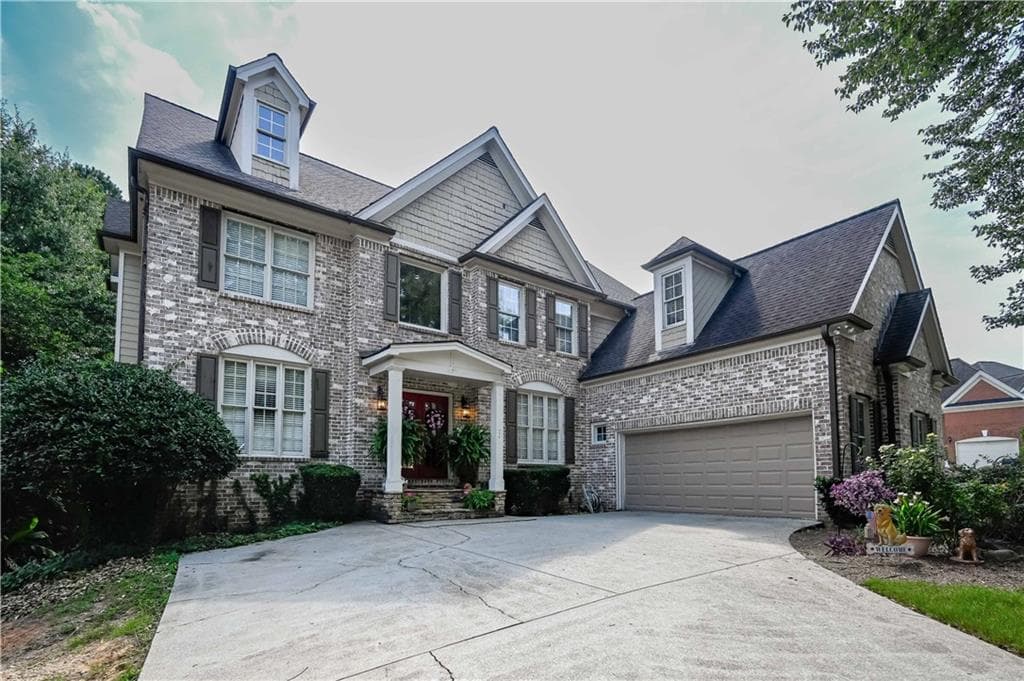 6 bedroom, 5 bathroom, 6,400 sq ft single family residence for sale at 958 Wood Duck Court, Snellville, GA 30078