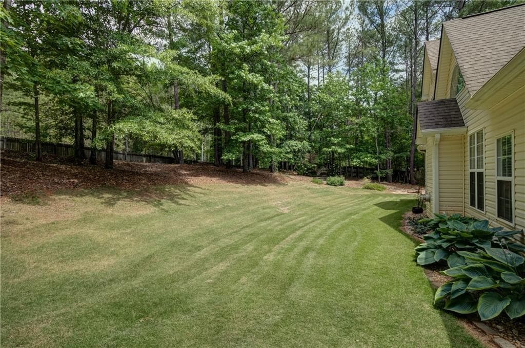 4 bedroom, 3 bathroom, 2,260 sq ft single family residence for sale at 110 Rockglen Court, Fayetteville, GA 30215 — photo 5
