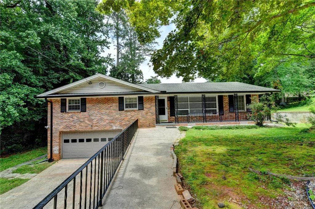 5 bedroom, 3 bathroom, 2,650 sq ft single family residence for sale at 3900 Greystone Court, Stone Mountain, GA 30083 — photo 2