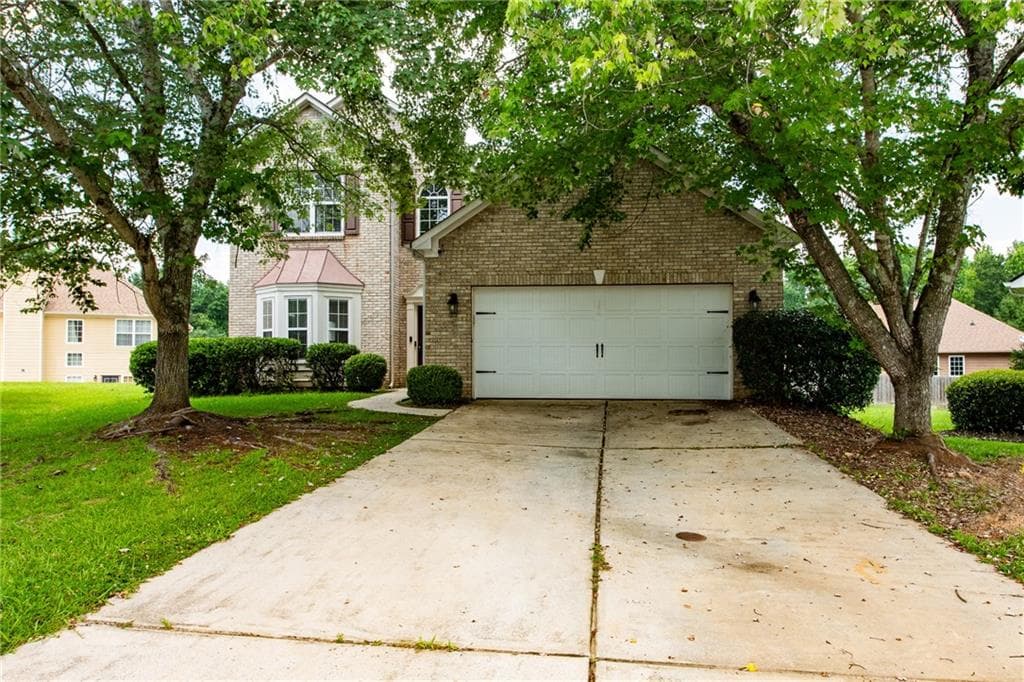 4 bedroom, 3 bathroom, 2,336 sq ft single family residence for rent at 7702 Parkside Drive, Lithia Springs, GA 30122 for $2,250 a month — photo 1 of 37