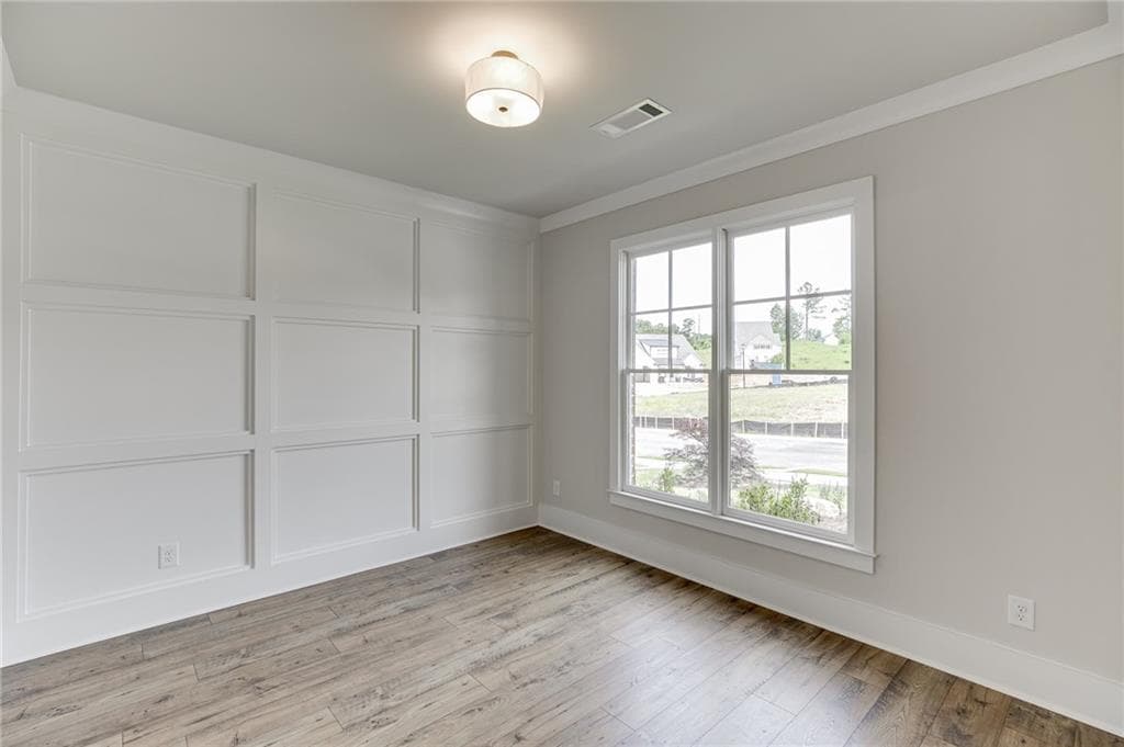 5 bedroom, 4 bathroom, 3,339 sq ft single family residence for sale at 1813 Piney Bend Drive, Buford, GA 30518 — photo 6
