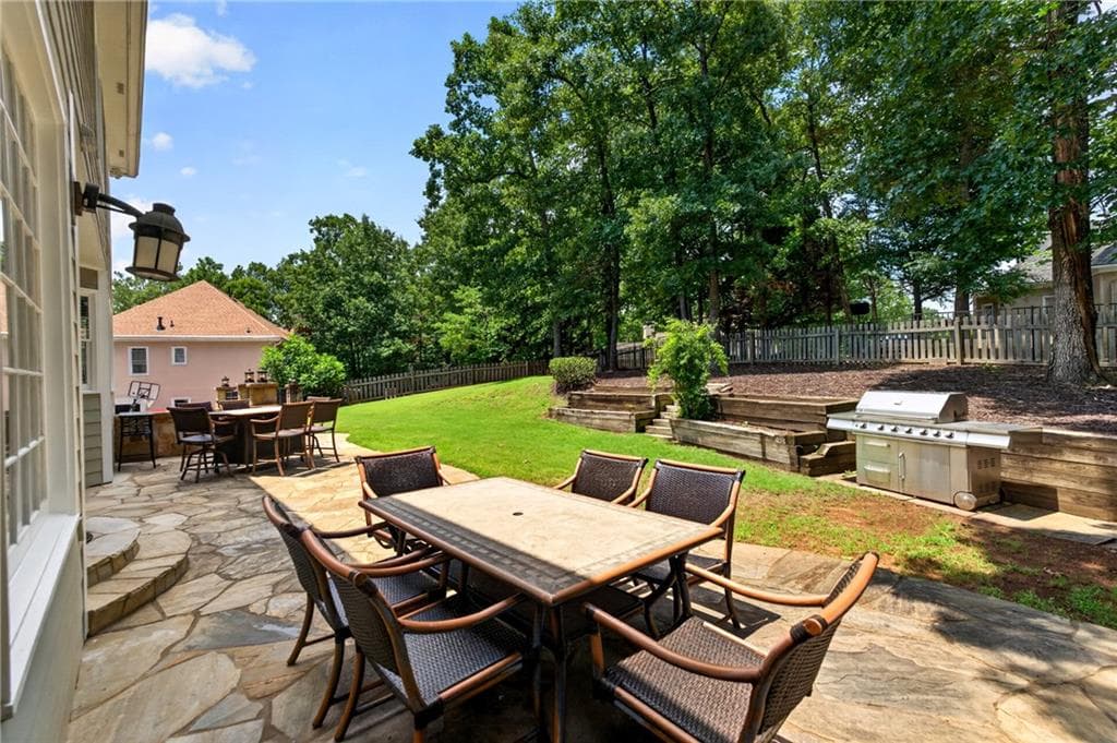 6 bedroom, 5 bathroom, 4,800 sq ft single family residence for sale at 5490 Hampstead Way, Johns Creek, GA 30097 — photo 5