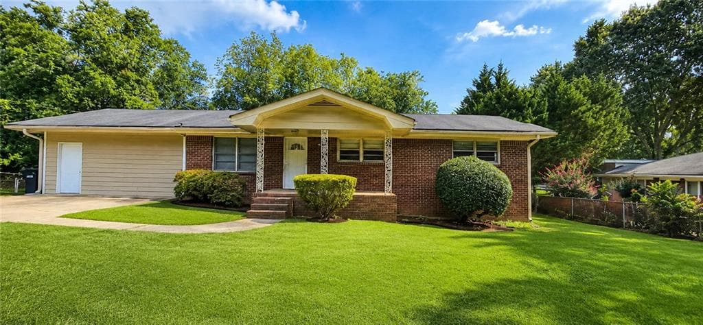 4 bedroom, 2 bathroom, 1,382 sq ft single family residence for sale at 1156 E Fayetteville Road, Riverdale, GA 30296 — photo 1 of 43