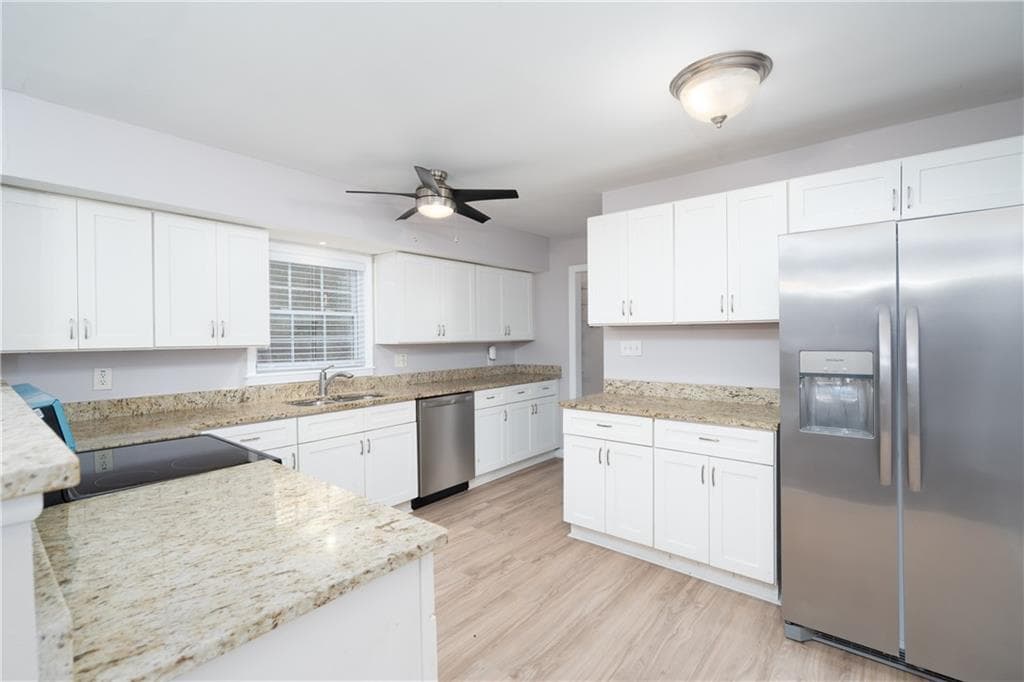 4 bedroom, 3 bathroom, 1,625 sq ft single family residence for sale at 4770 Campbell Drive, South Fulton, GA 30349 — photo 4
