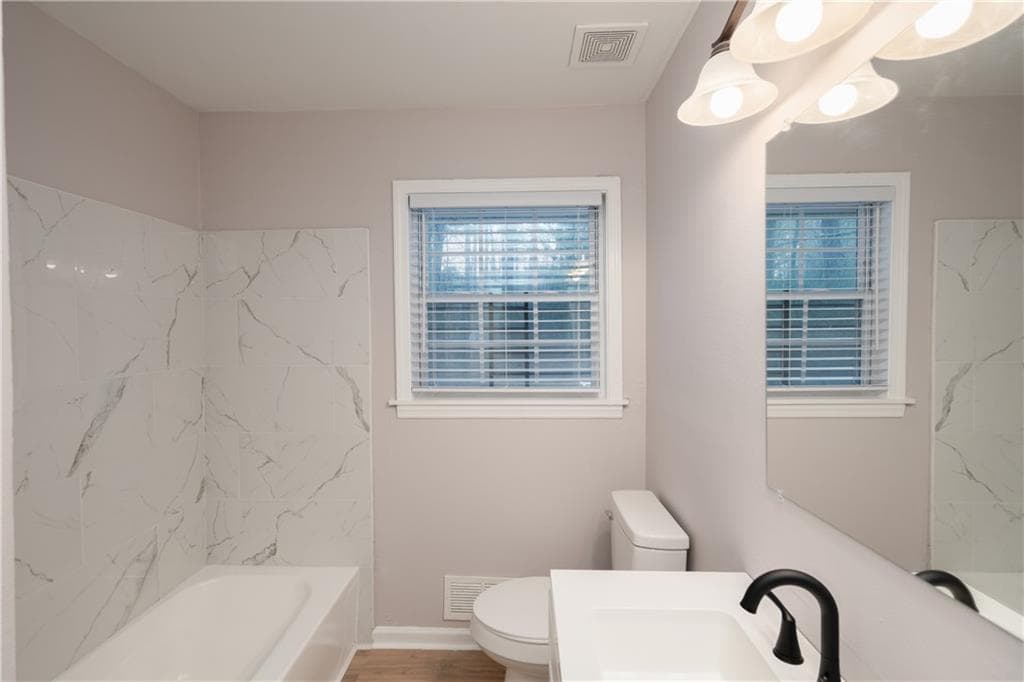 4 bedroom, 3 bathroom, 1,625 sq ft single family residence for sale at 4770 Campbell Drive, South Fulton, GA 30349 — photo 7
