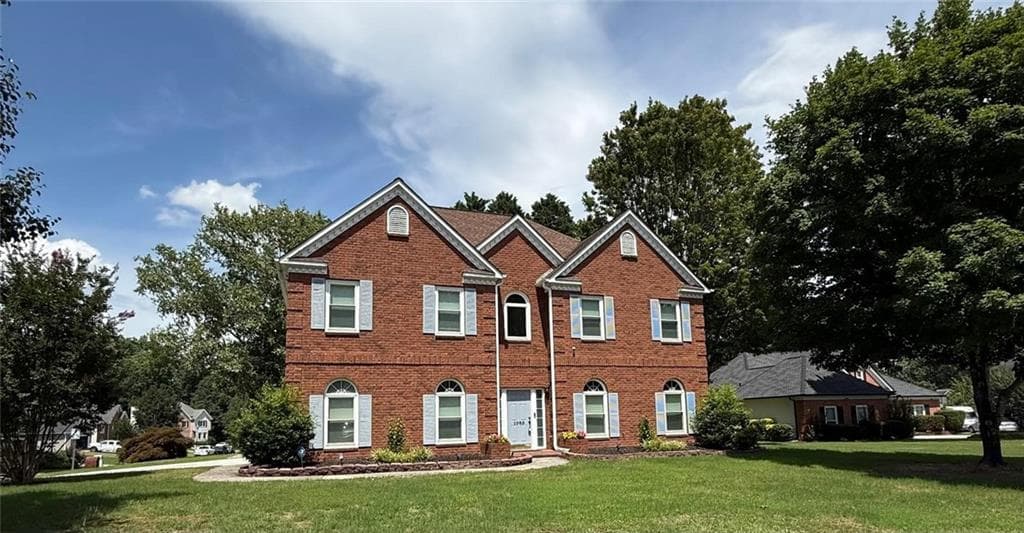 4 bedroom, 3 bathroom, 2,931 sq ft single family residence for sale at 1085 Grace Hadaway Lane, Lawrenceville, GA 30043 — photo 1 of 62