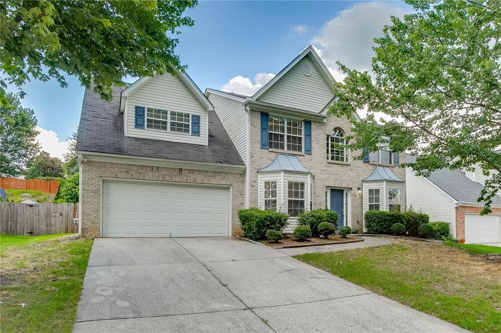 4 bedroom, 3 bathroom, 2,435 sq ft single family residence for sale at 2054 Pierce Way, Buford, GA 30519 — photo 2