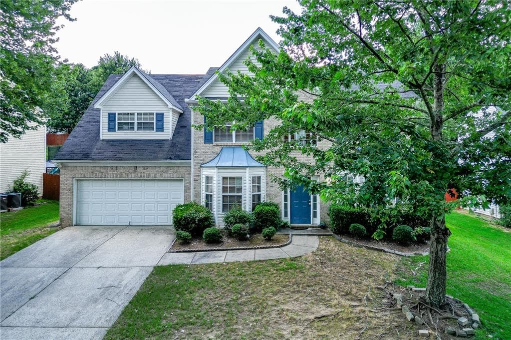 4 bedroom, 3 bathroom, 2,435 sq ft single family residence for sale at 2054 Pierce Way, Buford, GA 30519 — photo 3