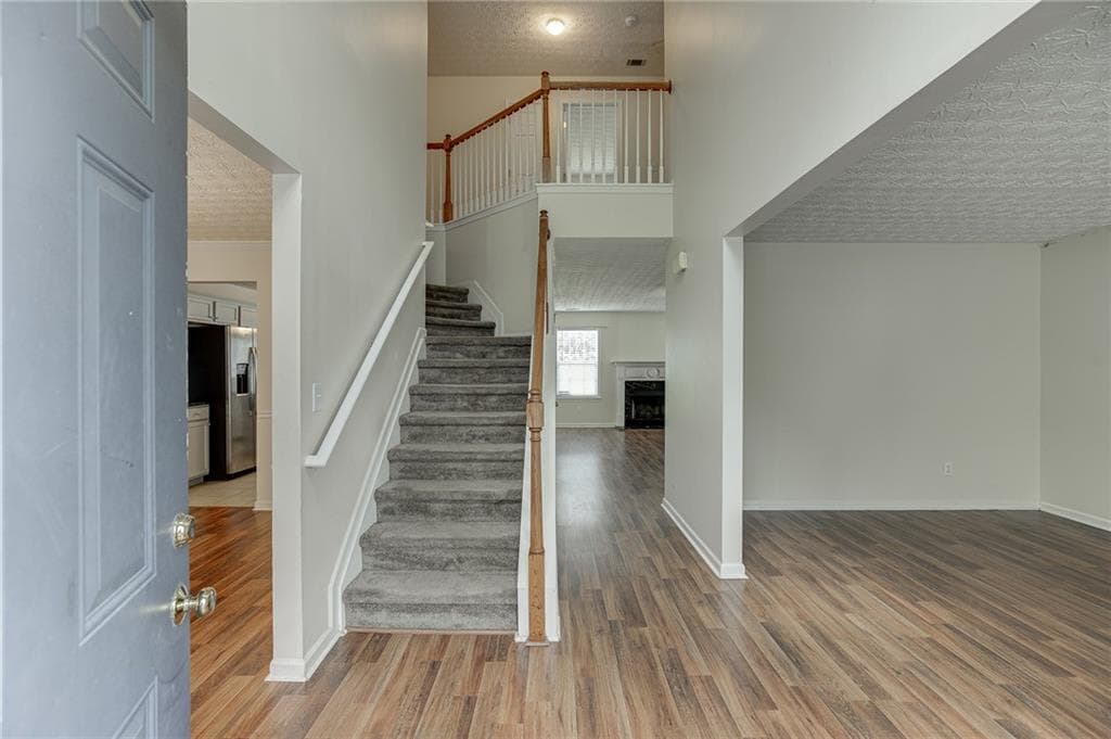 4 bedroom, 3 bathroom, 2,435 sq ft single family residence for sale at 2054 Pierce Way, Buford, GA 30519 — photo 4