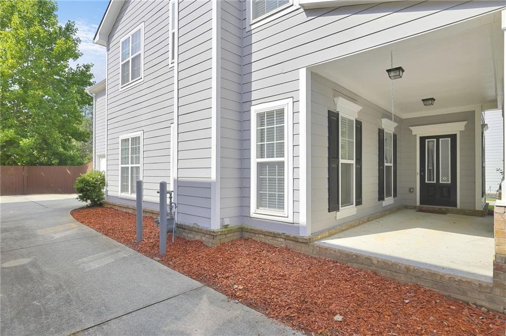 3 bedroom, 3 bathroom, 1,888 sq ft single family residence for sale at 4100 Lake Pass Lane, Suwanee, GA 30024 — photo 4