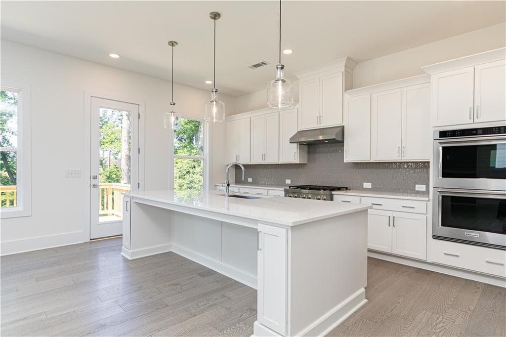 5 bedroom, 6 bathroom, 3,620 sq ft single family residence for sale at 4315 Waylon Drive Lane, Cumming, GA 30028 — photo 9