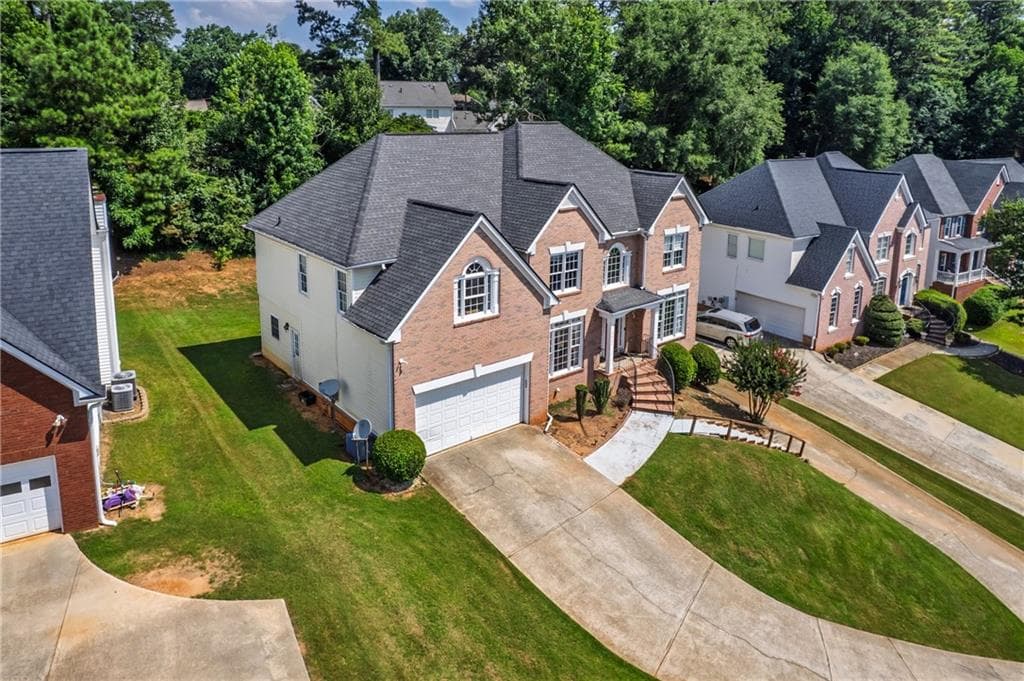 7 bedroom, 4 bathroom, 4,107 sq ft single family residence for sale at 4461 Weston Drive, Lilburn, GA 30047 — photo 2