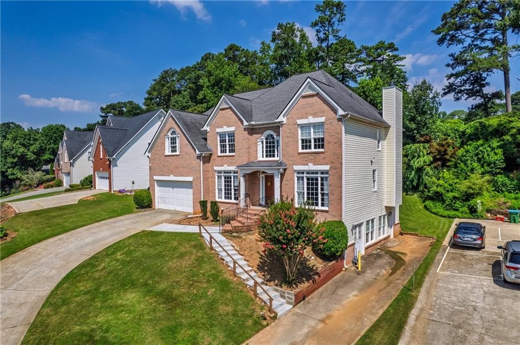 7 bedroom, 4 bathroom, 4,107 sq ft single family residence for sale at 4461 Weston Drive, Lilburn, GA 30047 — photo 3